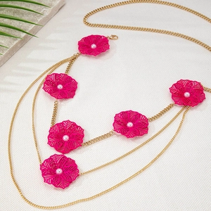 Elegant gold body chain featuring layered pink hollow flowers with pearl centers