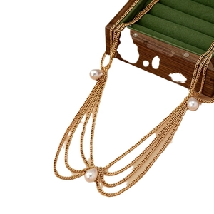 Bohemian gold layered multi-strand necklace with elegant pearl drop pendants