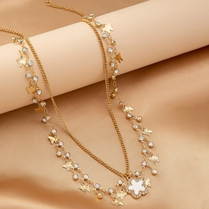 Accessoire de cheveux doré multicouche avec pendentifs trèfle et cristaux brillants