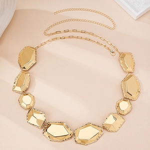 Macro shot of irregular geometric gold waist chain with adjustable lobster clasp links