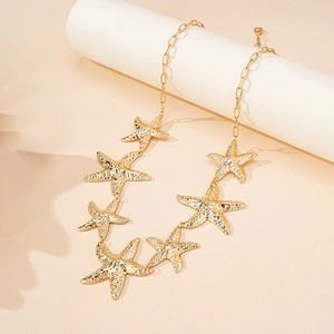 Golden starfish pendant chain with hammered texture and paperclip link for beach style