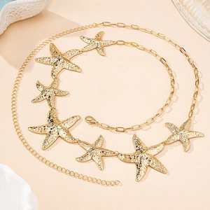 Bohemian gold starfish waist chain for beach vacation with elegant sea shells and coral