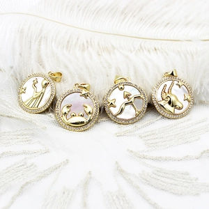 Set of four 18K gold plated zodiac pendants with white shell and micro-pave zircons