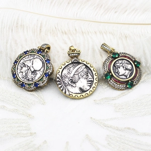 Vintage Greek coin pendant with engraved goddess portraits and colorful gemstone accents