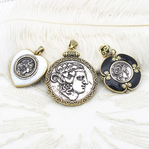 Vintage Greek coin pendant set with goddess relief in heart and floral patterns