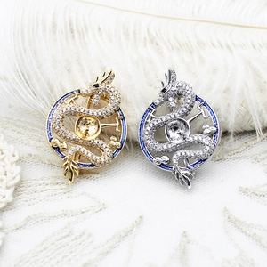 Exquisite 18K gold and silver dragon brooches with crystals and abalone shell accents