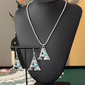 Vintage alloy letter A necklace and earrings set with turquoise and bohemian carvings