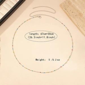Detail of colorful beaded metal waist chain featuring 67cm length and adjustable lobster clasp