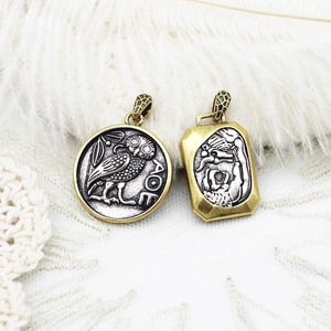 Vintage Greek coin pendants featuring Athena's owl and goddess portrait on white feathers