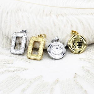 Polished geometric metal pendants in gold and silver with intricate CNC textured patterns