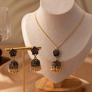 Vintage luxury flower bell necklace and earring set in gold with black enamel