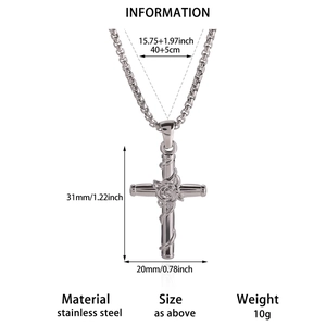 Detailed macro view of stainless steel cross pendant with rose vine engravings and dimensions