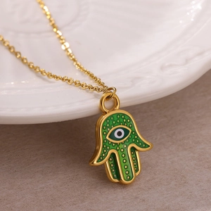 Bohemian gold stainless steel Hamsa Hand pendant with green enamel and evil eye charm necklace