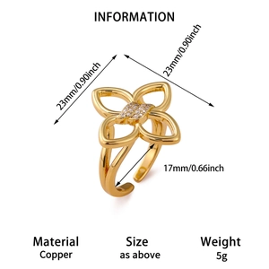 Elegant gold flower ring with clover design and cubic zirconia stones in copper material