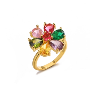 Anello a quadrifoglio rotante con zirconi a fiori colorati, finitura dorata