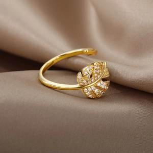 Elegant 18k gold monstera leaf open ring with pink and white cubic zirconia stones