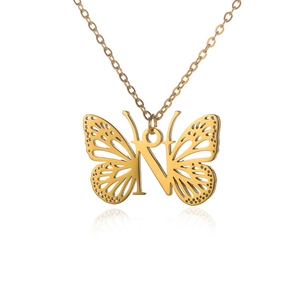 Golden butterfly necklace with letter N pendant and hollow wings on a white base