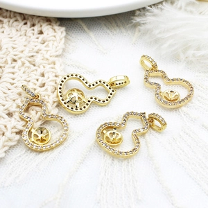 Detail of 18K gold plated zircon gourd pendants with pearl mounting for jewelry DIY