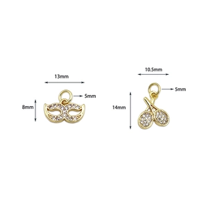 18K gold plated mask and tennis racket pendants with micro-pave crystals and measurements