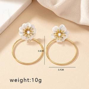 Detail view of burgundy daisy earrings with dimensions 5.5cm height and 3.7cm width