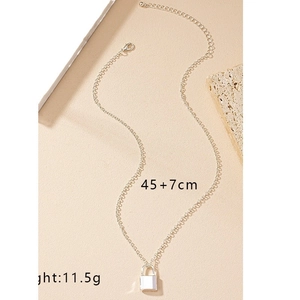 Minimalist silver lock pendant necklace with 45+7cm chain length and 11.5g weight info