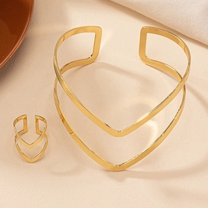 Golden chevron open arm cuff and ring set with minimalist double-layered V-shape design