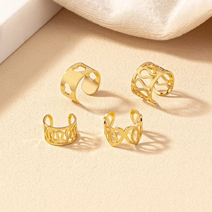 Chic 4-piece gold ear cuff set with heart and geometric patterns in hollow design