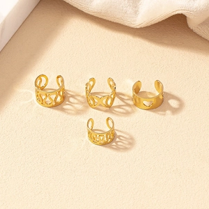 Set of 4 gold hollow heart and geometric pattern ear cuffs for non-pierced ears