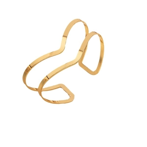 Modern gold-colored wavy open bangle with minimalist artistic hollow structure design