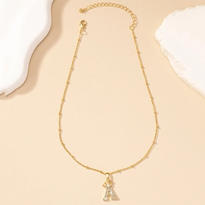 Detailed close-up of a gold-plated crown initial A necklace with sparkling rhinestones