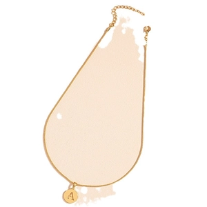 Minimalist gold snake chain necklace featuring a polished round letter A pendant charm