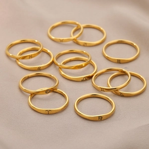 18k gold plated stainless steel rings featuring engraved minimalist zodiac symbols