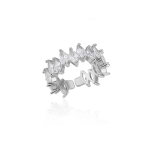 Macro detail of silver marquise-cut cubic zirconia layered ring with mirror reflection