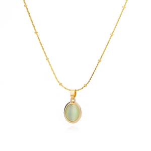 Minimalist gold satellite chain necklace featuring an oval light green cat eye pendant