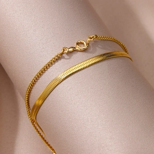 Detail of 18k gold plated stainless steel double layer snake and link anklet chain