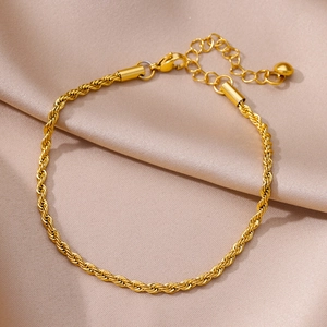 Close-up of gold-plated stainless steel rope chain anklet with lobster clasp and extension