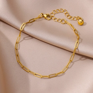 Detail of 18k gold plated stainless steel paperclip chain anklet with lobster clasp