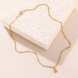 Detail of 18K gold-plated bubble letter R pendant on a bead chain with lobster clasp