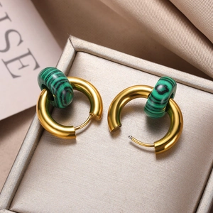 Detail of French vintage gold hoop earrings with green malachite stone donuts