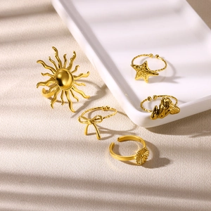 5er-Set verstellbare goldene Edelstahlringe mit Sonnenblumen, Seesternen und Schleifen