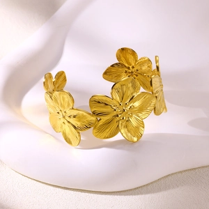 Elegant gold flower cuff bangle with brushed texture petals and open adjustable design