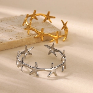 Polished stainless steel starfish open cuff bracelet in gold and silver finish