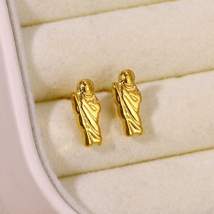 Detailed macro view of 18K gold plated Saint Jude embossed cross earrings in gift box