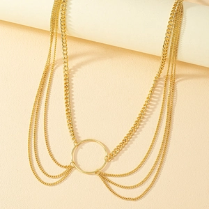 Chic multi-layer gold tassel body chain with central ring and punk style draping links