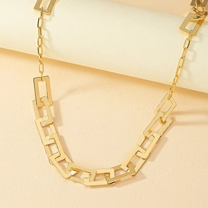 Gold geometric paperclip link body chain with industrial minimalist chunky chain design