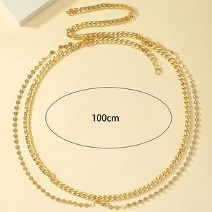 Detailed view of 100cm golden double layer metal body chain with curb and leaf charms