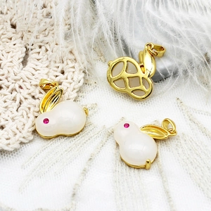 18K gold plated rabbit jade pendants featuring red gemstone eyes and hollow mesh back