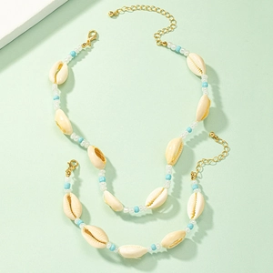 Beach vacation style natural shell and turquoise bead necklace and bracelet jewelry set