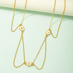 Gold evil eye body chain for women with heart pendants and bohemian style charms