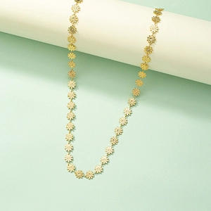 Elegant gold daisy chain body belt featuring intricate metal flower link necklaces